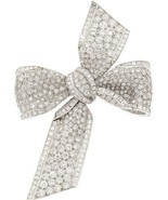 Authenticity Guarantee

Tiffany &amp; Co. Platinum Diamond Bow Brooch 1950s ... - $586,858.68 MXN