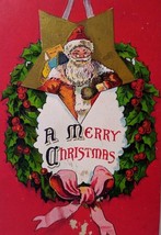 Santa Claus Saint Nicholas Christmas Postcard Hanging Inside Wreath Series 1164 - $14.85