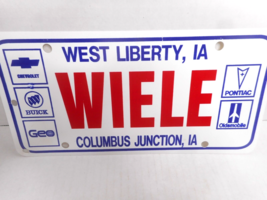 Wiele West Liberty, Ia - Columbus Junction, Ia Plastic Dealer License Plate - £11.06 GBP