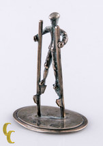 Miniature Vintage Dollhouse Silver Figurine Man Walking On Stilts - £65.66 GBP