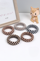 Black Checkered Print Nylon Elastic Hair Tie - $52.86 MXN