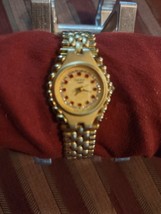 Women&#39;s Round 18k Gold Plated OMAX Watch with Rubies Watch - $1,658.95 MXN