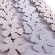 Die Cut Flowers in Off-White Leather - $12.00