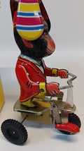 Vintage tin toy monkey on tricycle.  Not working for display or repair o... - $10.00