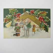 Christmas Postcard Children Build Snowman Holly Berries Gold Embossed Antique - £11.77 GBP