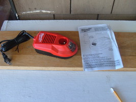 Milwaukee M4 4 volt 48-59-2001 lithium battery charger only. New older stock.  - $43.00