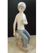 CASADES SPAIN PORCELAIN FIGURINE BOY SEATED ON ROCKS HOLDING PHONE 9&quot; TALL - £21.08 GBP