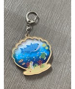 Retro sea friends scallop sand keychain - $479.16 MXN