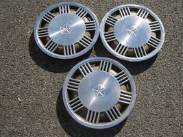 Genuine 1988 to 1991 Dodge Dynasty Plymouth Acclaim hubcaps wheel covers - $46.40