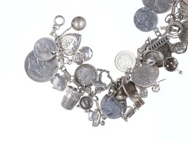 Loaded Vintage Super Traveler Sterling Silver world coins charm bracelet - $232.65