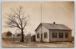 RPPC One Room Schoolhouse With Flagpole And Outhouse c1907 Photo Postcard F36 - $14.95