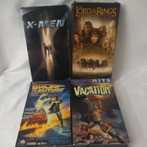 Lot of 4 Vintage VHS Tapes X Men Lord of the Rings,BTTF, Lampoons Vacation  - £20.23 GBP