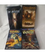 Lot of 4 Vintage VHS Tapes X Men Lord of the Rings,BTTF, Lampoons Vacation  - £20.23 GBP