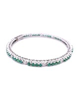 Authenticity Guarantee 
4.57ctw Emerald and Diamonds 10K White Gold Bangle - $3,971.98 CAD