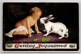 Easter Greetings Baby With Black And White Bunny Rabbit Postcard T28 - £4.67 GBP