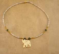primitive Elephant necklace - hand beaded puka jade - talisman tribal  necklace  - £58.98 GBP
