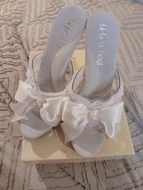 Highest Heel Collection Size 7 White Bow Slip On  - $19.99