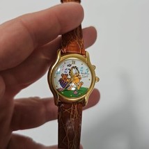 Armitron Garfield Musical Watch Gold Tone Brown Leather Vtg Needs Battery - £19.45 GBP