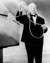 Alfred Hitchcock holds rope at Suggestions box 8x10 inch photo - £7.77 GBP