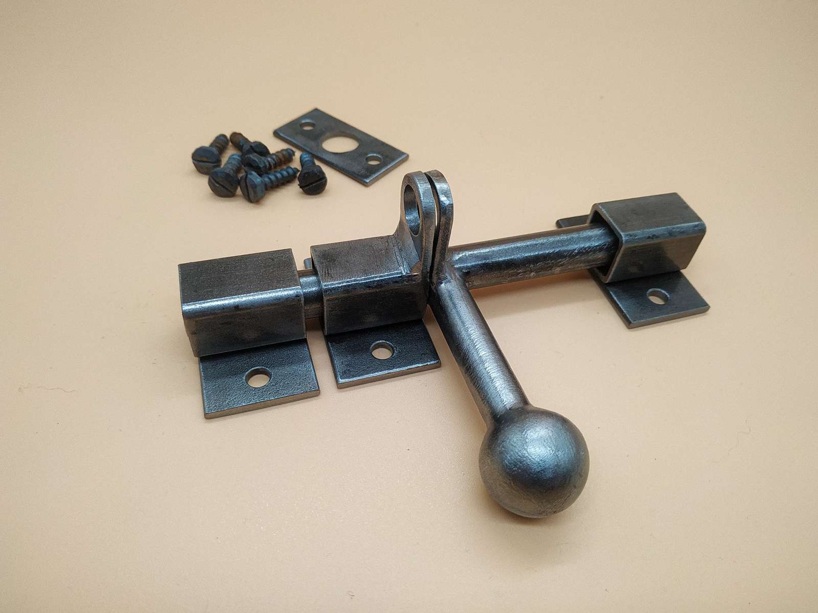 A door latch, handcrafted in a rustic style, ensures reliable and easy c... - $34.63