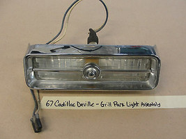 67 Cadillac Deville GRILL PARK TURN SIGNAL LIGHT LENS CHROME BEZEL TRIM ... - £117.67 GBP