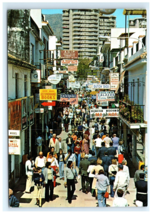 1978 San Miguel Street View Signs Shops Postcard - $5.95