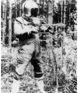 1970’s UFO armed space suited alien in forest setting b/w 8x10 scene. - $9.11 CAD