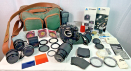 Minolta New X-700 35mm SLR Film Camera + 95mm Zoom Lens, 50mm Lenses, Ba... - £233.62 GBP