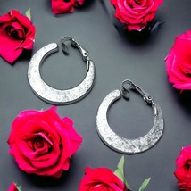 vintage avon clip On Texture silverTone hoop earrings - $9.97