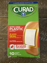 CURAD EXTRA LARGE PLASTIC BANDAGE w/4 SIDED SEAL. 2X MORE ABSORBENT. 10 ... - $9.78
