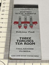 Front Strike Matchbook Cover  Three Torches Tea Room  Tallahassee, FL  gmg - £9.73 GBP
