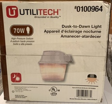 UTILITECH 0100964, model MD70HWUT, Dusk to Dawn Light, Amber, New-in box - $38.59