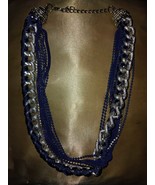 This is a bold and modern multi-strand necklace with metallic flair - $20.53 CAD