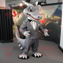 Gray Dragon mascot costume character dressed with a Suit Jacket and Shoe clips - $1,279.00