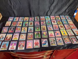 1985 - 1987 Garbage Pail Kids Mixed Lot Of 60 Cards With Toploader Hard Sleeves - $65.44