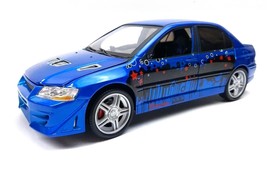 ERTL/Racing Champions Fast &amp; Furious 1:18 blue Mitsubishi Lancer Evo VII - $66.23