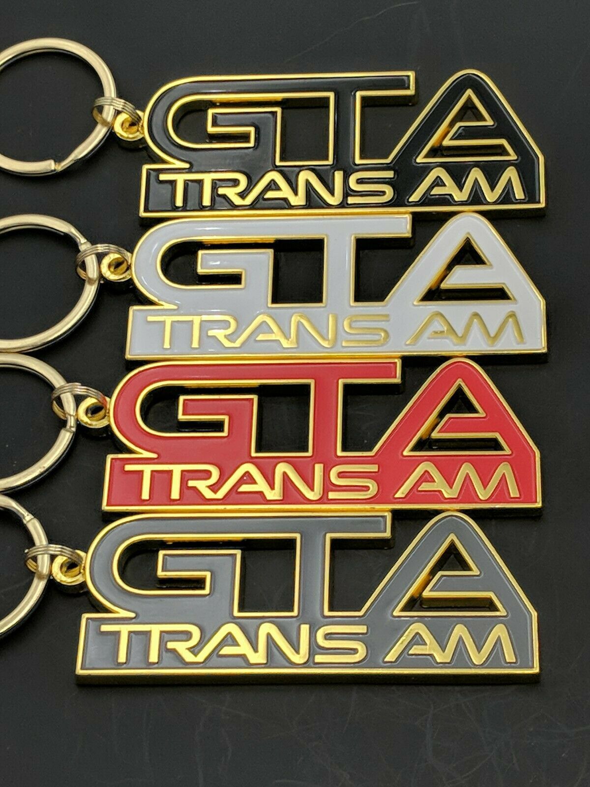 Pontiac GTA Trans Am Emblem/Keychains. 4 colors to choose @ $14.99ea. (J2)