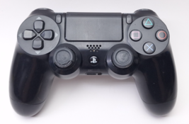 OEM Sony black PS4 Wireless DualShock 4 Controller (Broken, For Parts) - $185.60 MXN