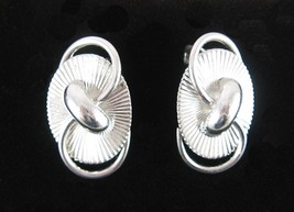 CORO Oval Clip On EARRINGS Vintage Shiny Lined S Curl Under Loop Silvertone 1.5&quot; - £14.85 GBP