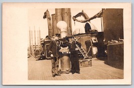 Two Sailors Onboard A Ship Postcard - $20.00