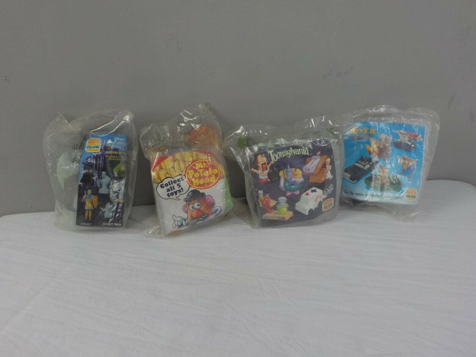Primary image for Four 1980's 90's Vintage Unopened Burger King Kids Club Toys