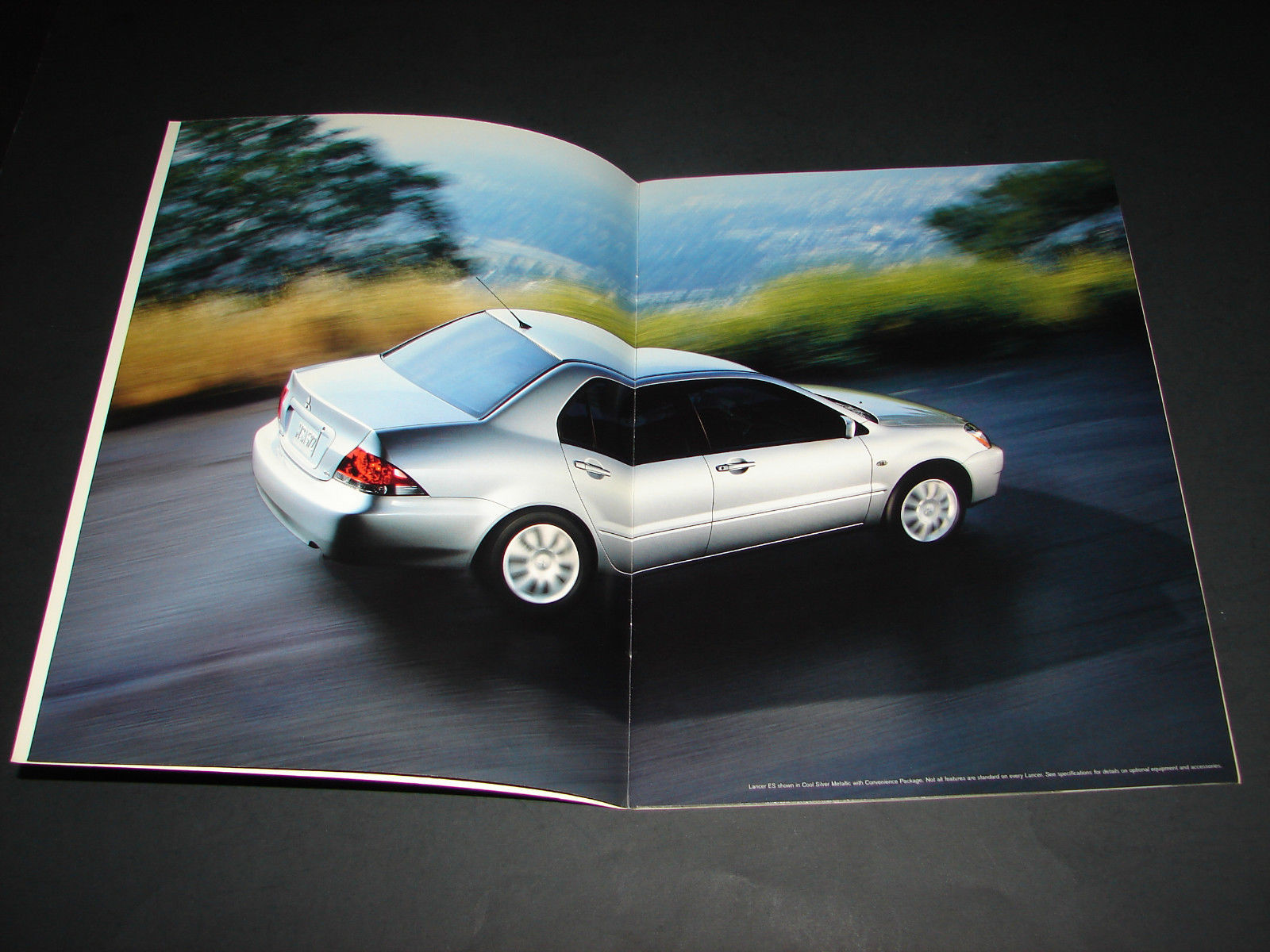 2006 Mitsubishi LANCER Automobile Dealership Brochure car DRIVEN TO THRILL Triad Item image 5