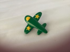 A Vintage Green Airplane Pin with Yellow Stars  2 Inches - $14.85