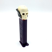 SKULL with black cape vintage PEZ dispenser - purple stem hole in nose thin feet - £7.85 GBP