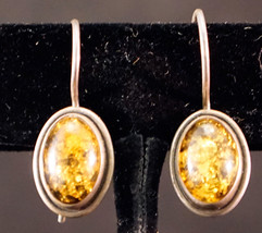 Genuine Amber Earrings Set in .800 Silver Setting Marked KW 800 - $32.00