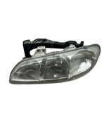 Pontiac Grand AM : 1996, 1997, 1998, Left Driver Headlight With Bracket OEM - $47.54 CAD