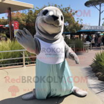 Silver Sea Lion mascot costume character dressed with a Midi Dress and Mittens - £1,005.76 GBP