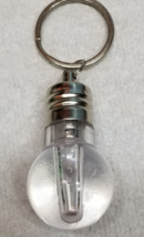Light Bulb Keychain Flashlight Silver Bottom Acrylic Clear Top Metal 2008 - $11.35