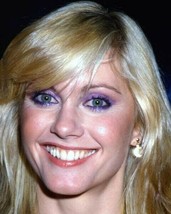 Olivia Newton-John lovelyclose-up smiling for cameras circa 1978 24x30 inch post - $29.99