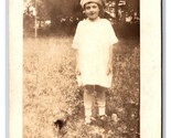 RPPC Adorable Child in White Standing in Field UNP Postcard L17 - $3.91